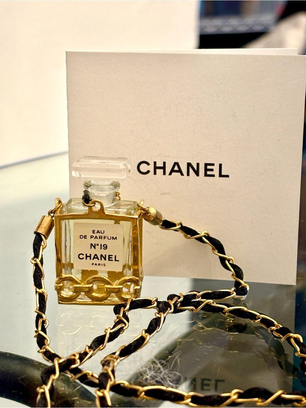 CHANEL Gold and Clear N°19 Perfume Bottle Pendant Necklace